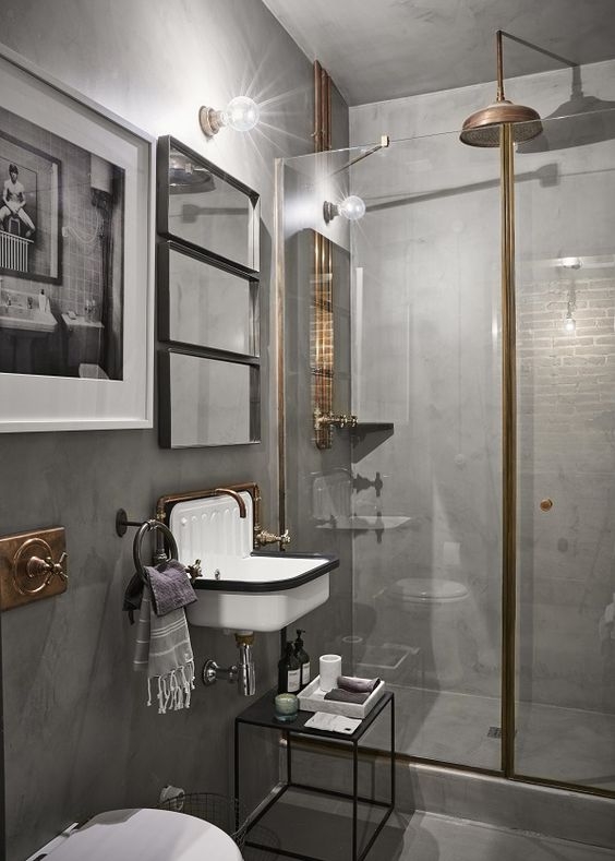 Industrial Bathroom: Vintage Ceramic Wall Mount Sink and Concrete Finish