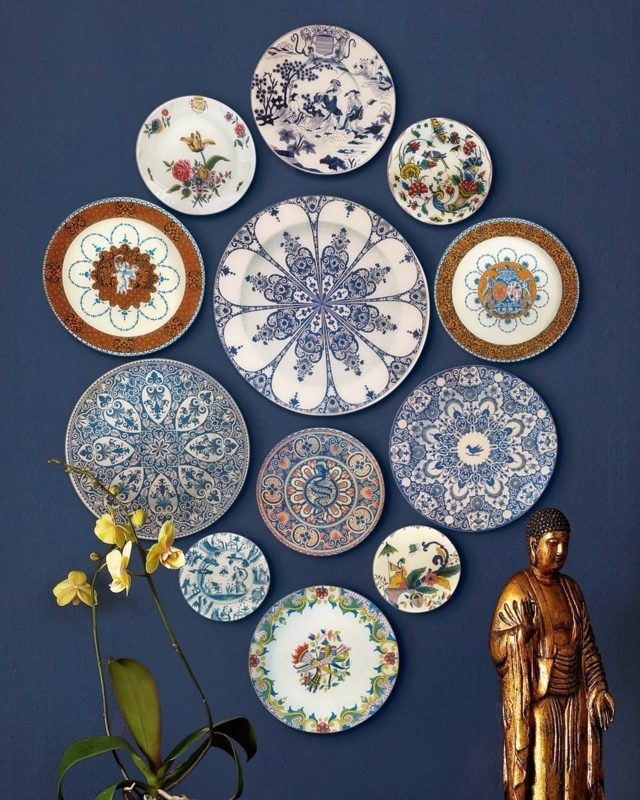 Intricate Radial Pattern Wall Plates on Midnight Blue Accent Wall