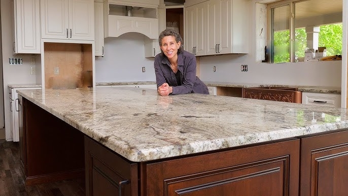 Kitchen Island with Bullnose Edge Granite Slab and Dual Tone Cabinetry