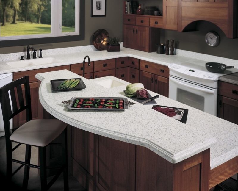 Kitchen Island with Curved Tiered Edge and Speckled Solid Surface