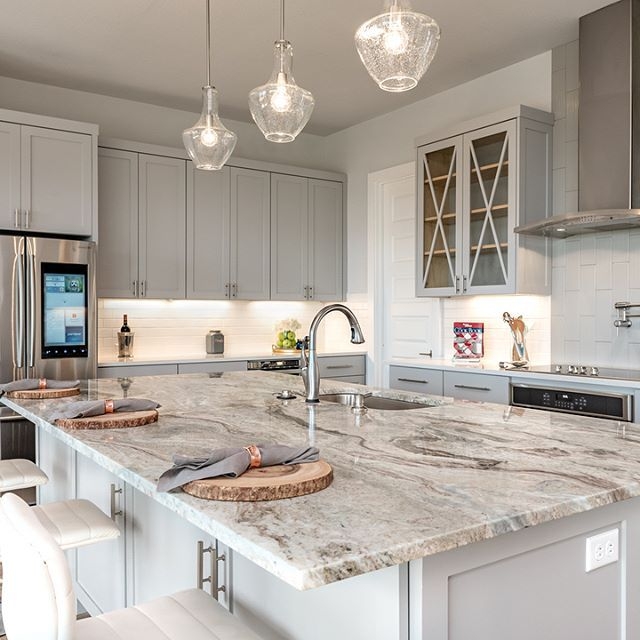 Kitchen Island with Fantasy Brown Granite and Teardrop Glass Pendants