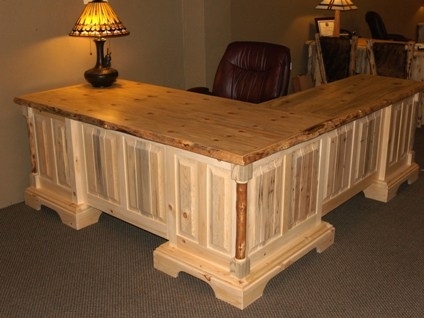 L-Shaped Desk sporting Live-Edge Top, Log Accents, and Rustic Craftsman Style