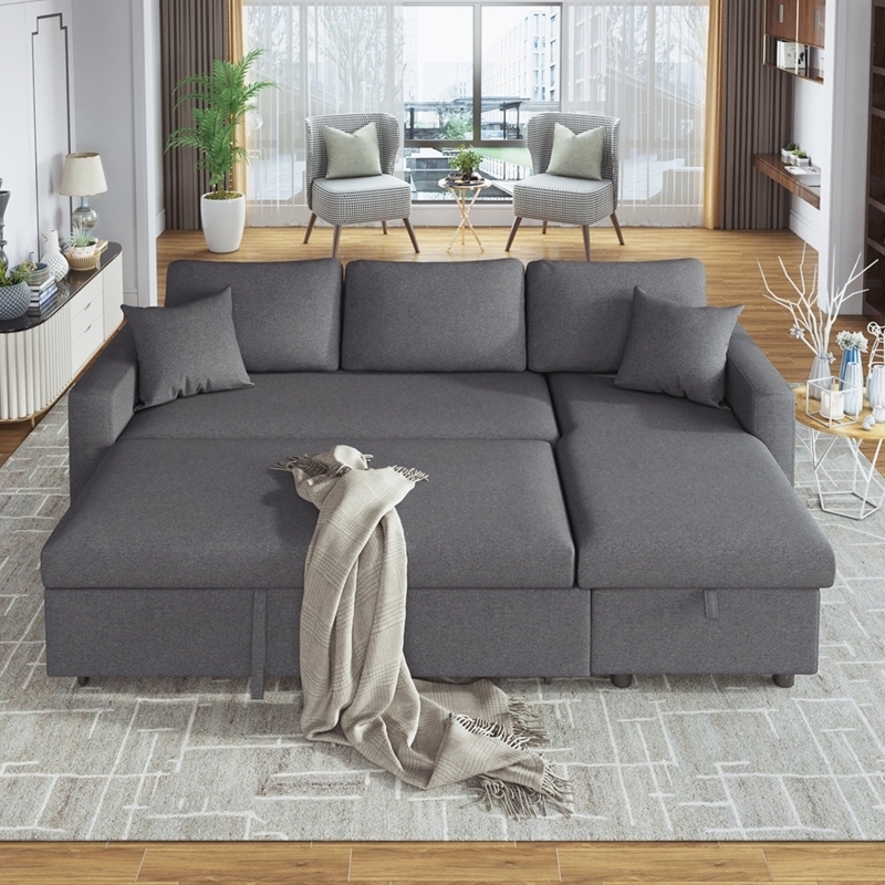 L-Shaped Sectional Sleeper: Charcoal Gray Fabric with Integrated Chaise.