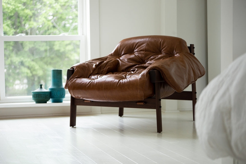 Lounge Chair featuring Oversized Padding and a Tufted Seat Cushion