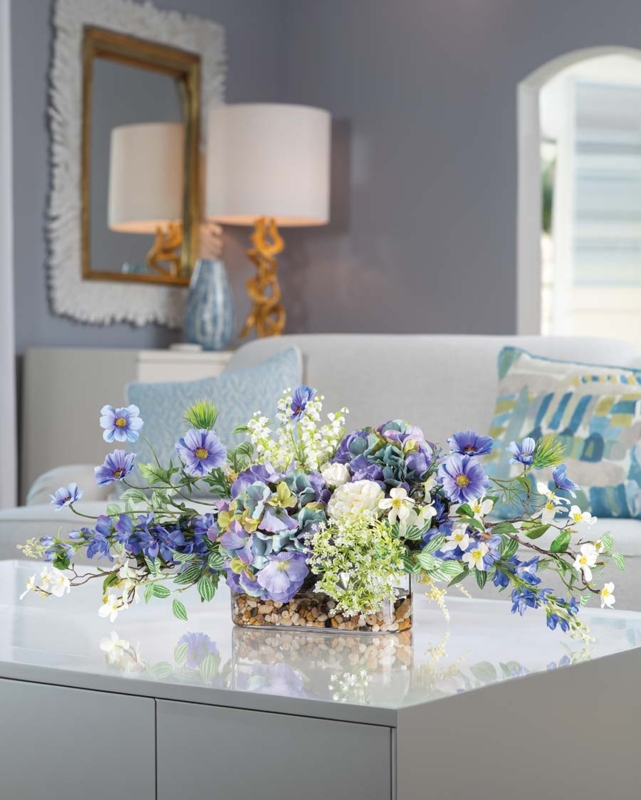 Low Profile Floral Arrangement with Horizontal Orientation and Pebbles