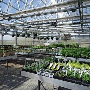 Metallic Silver Greenhouse Bench with Modular Layout and Raised Legs