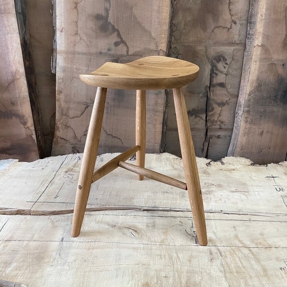 Milking Stool featuring Saddle Seat, Natural Oak Accent