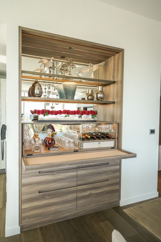 Minimalist Built-In Bar Flip-Down Counter Mirrored Backboard
