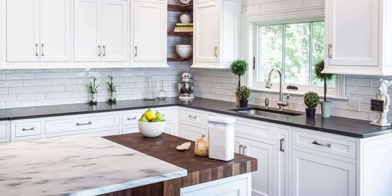 Mixed Material Kitchen Island featuring Stone & Wood Surfaces