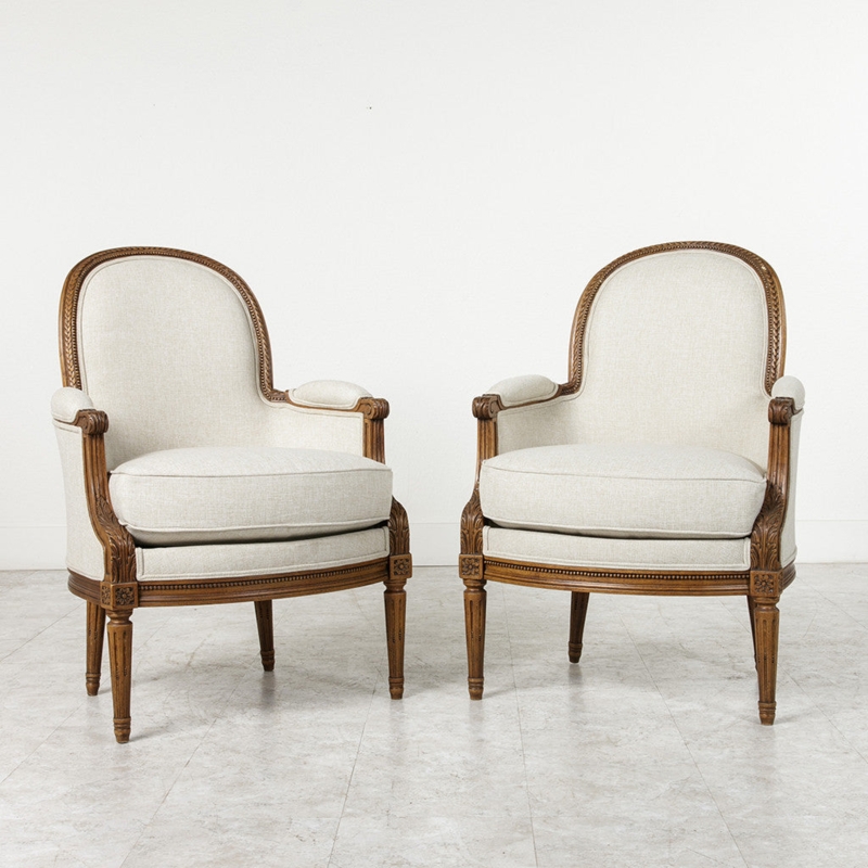Pair of Bergère Chairs in Cream Beige Linen with Rosette Carvings