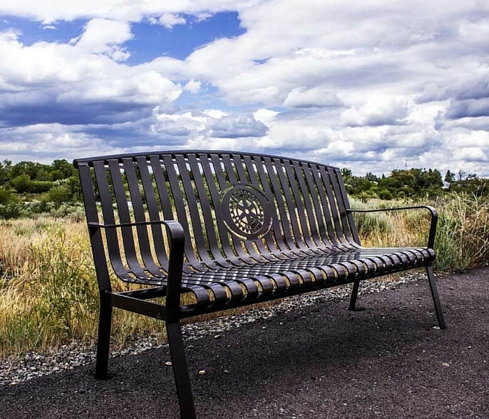 Park Bench Arched Back Circular Emblem Slatted Metal Industrial