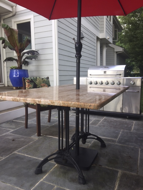 Patio Table: Dual Pedestal Ornate Base with Umbrella Port, Bistro Style.