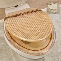 Pearlescent Gold Toilet Seat: Ribbed Elongated Lid with Scrollwork Trim.