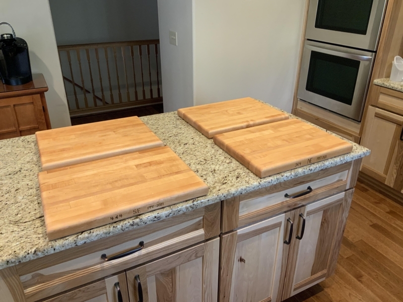 Personalized Wood Cutting Boards placed on Granite Kitchen Island