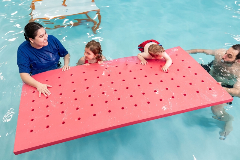 Pool Mat, Bright Red Swiss Cheese Perforations, Buoyant Surface Design