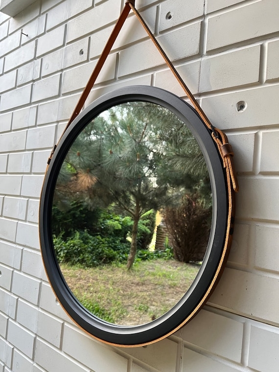 Round Mirror with Cognac Leather Strap Suspension & Black Frame