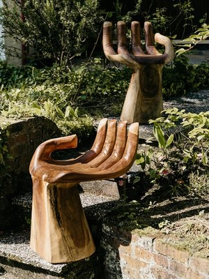 Sculptural Accent Chair: Handcrafted Carved with Solid Trunk Base