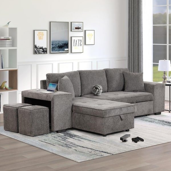 Sectional Sofa Bed: Charcoal L-Shaped with Tucked Stools and Storage.
