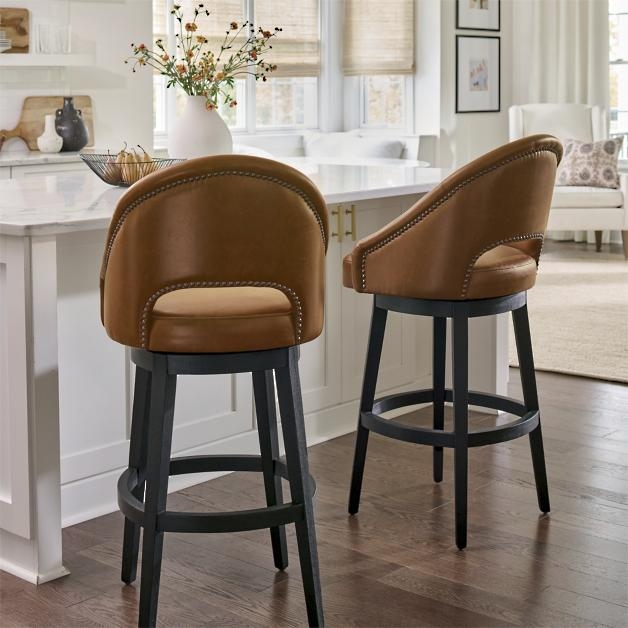 Swivel Bar Stool featuring Open Back Cutout and Nailhead Trim