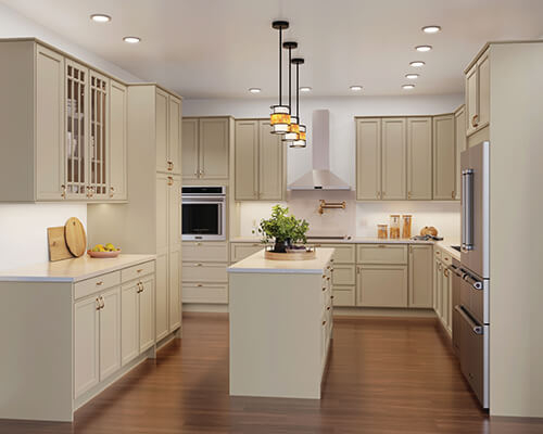 Transitional Beige Shaker Cabinets with Tiered Pendants and Glass Uppers