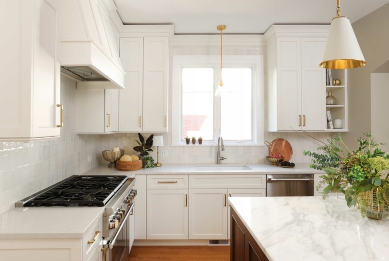 Transitional Ivory Shaker Cabinets with Gold Accents and Zellige