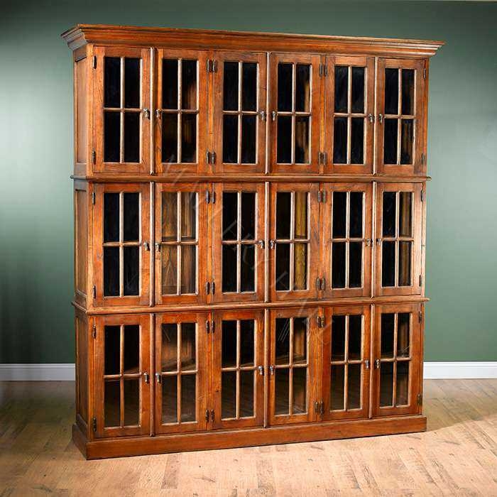 Tudor Style Bookcase Featuring Eighteen Divided Lite Glass Doors