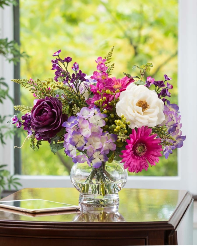 Vibrant Purple and Pink Centerpiece in Round Glass Vase