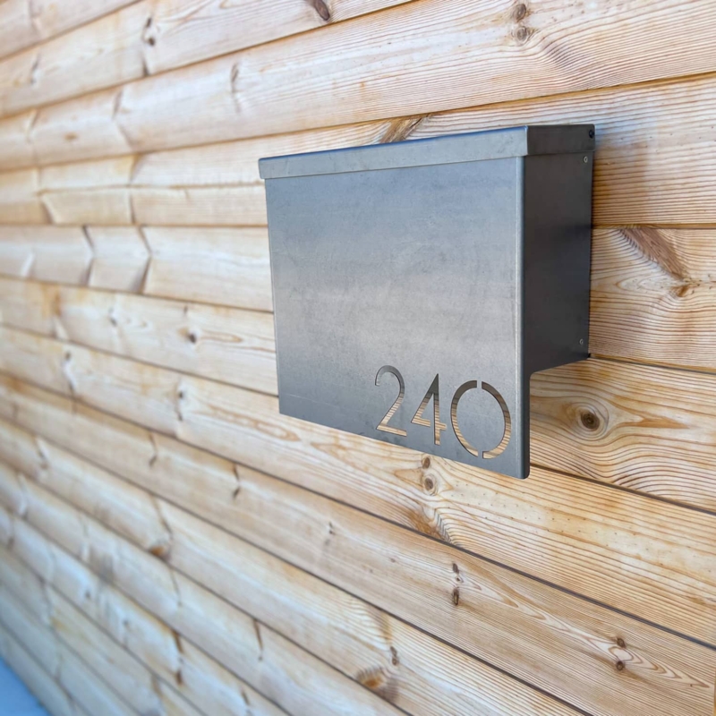 Wall Mount Mailbox: Industrial Raw Steel with Stencil Cut Numbers.
