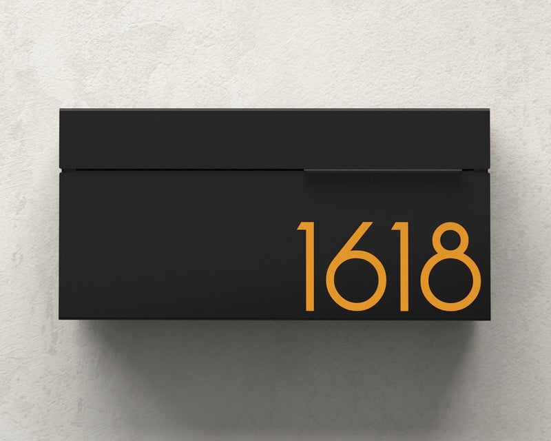 Wall Mount Mailbox: Matte Black Aluminum with Golden Orange Numbers.