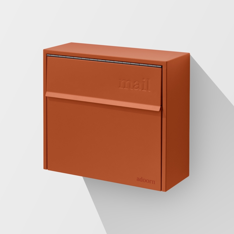 Wall Mount Mailbox: Slim Chili Red Finish with Embossed Mail Detail.