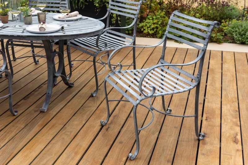 Weathered Grey Metal Carver Chair with Horizontal Slats and Scrolled Arms