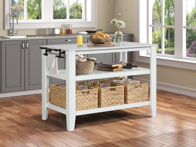White Kitchen Island with Woven Storage Baskets and Stone Like Top