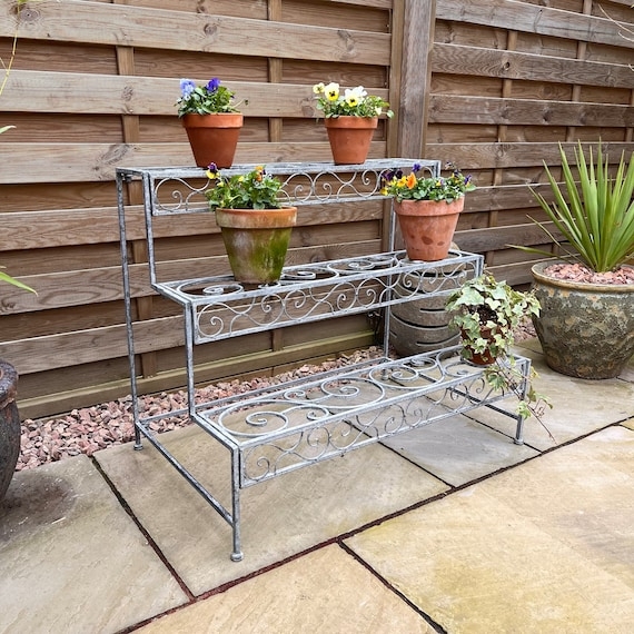 3-Tier Stepped Plant Stand with Ornate Scrollwork Detailing
