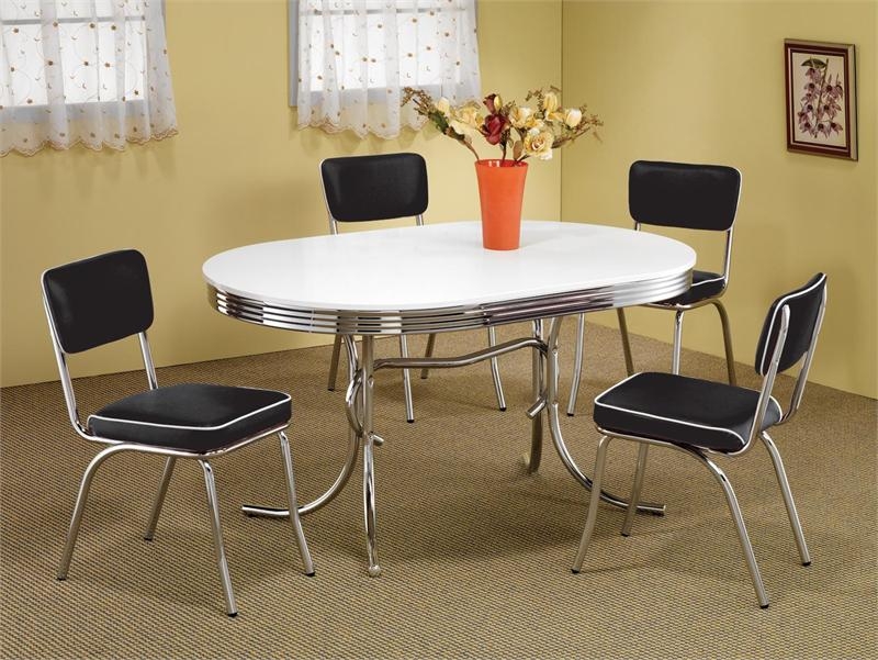 5-Piece Dining Set: Oval Table with Ribbed Edge, Black Vinyl Chairs