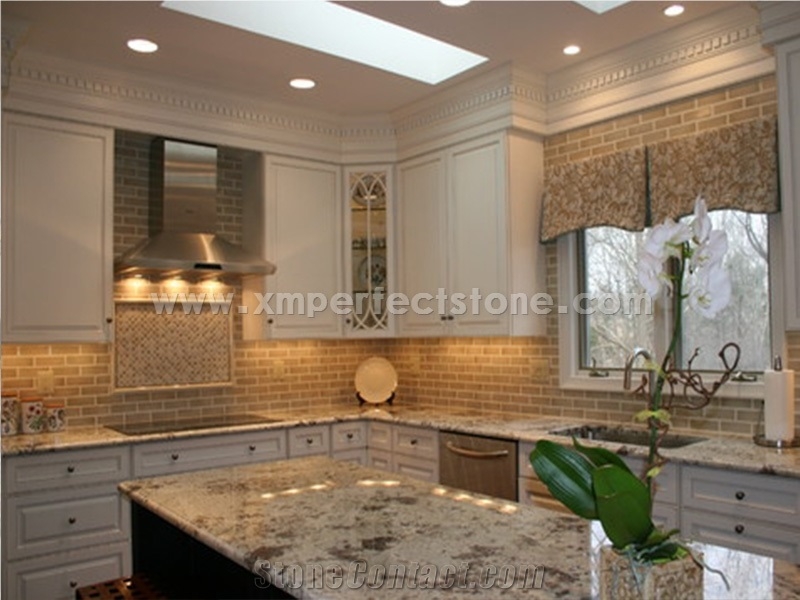 Alaska White Granite Kitchen Island With Subway Tile Backsplash