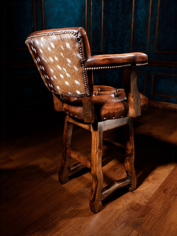 Bar Stool featuring Sculpted Wood Legs, Axis Deer Hide, and Tufted Seat