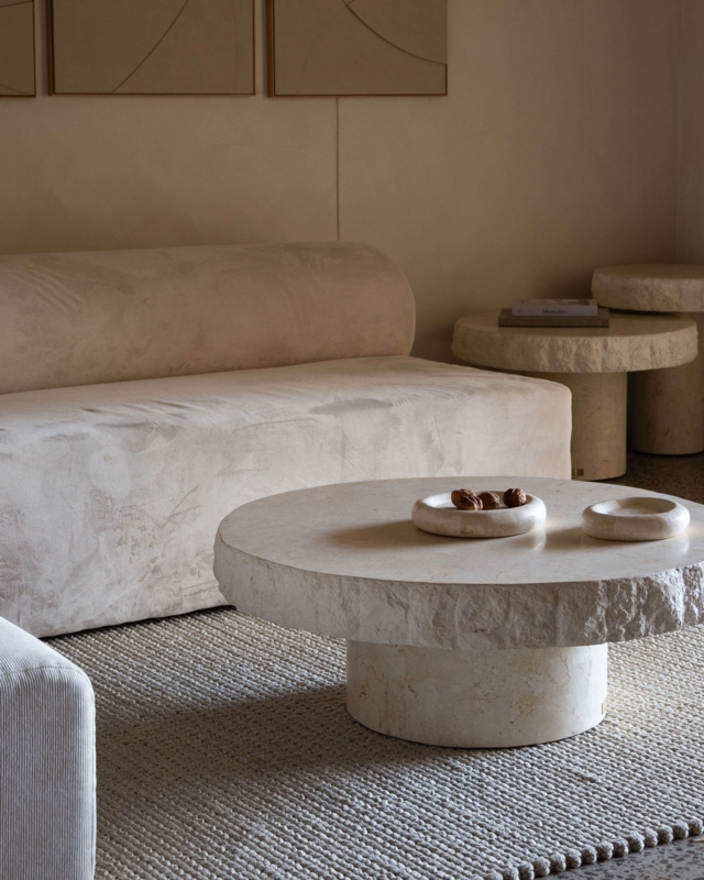 Beige Stone Round Coffee Table, Chiseled Edge, Pedestal Base.