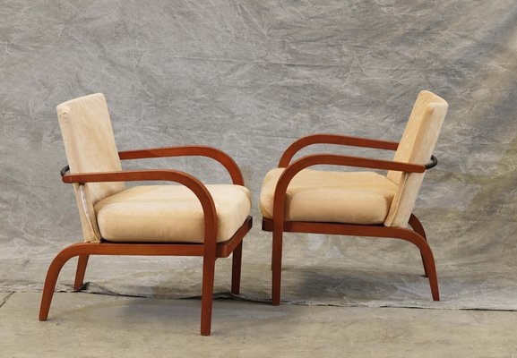 Bentwood Armchair featuring Metal Support Bar and Open Back Design