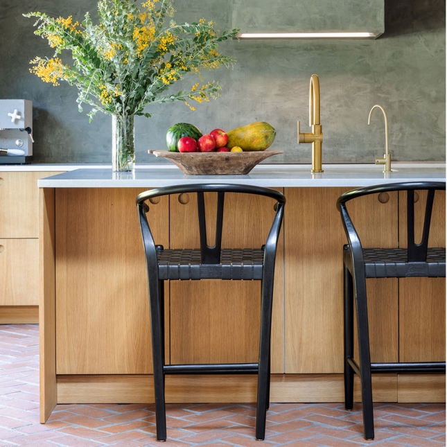 Black Wishbone Counter Stool with Woven Leather Seat, Matte Finish.