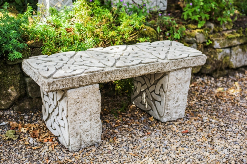 Celtic Knot Garden Bench: Weathered Stone Finish, Pedestal Legs.