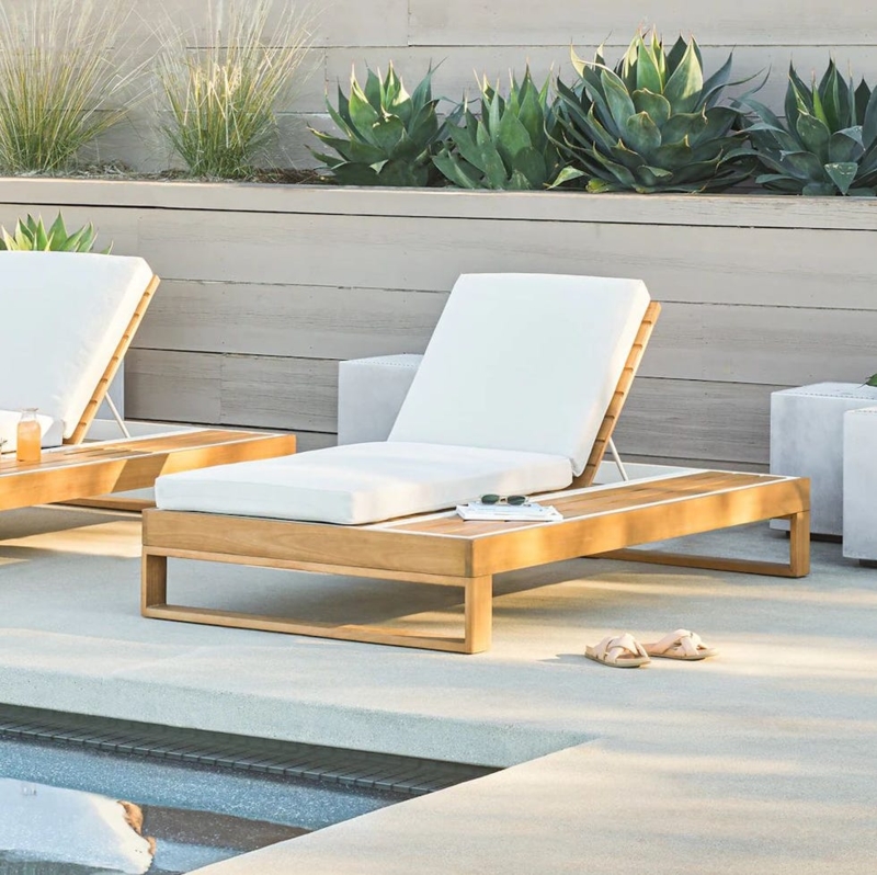 Chaise Lounge Featuring Integrated Side Platform and White Cushions