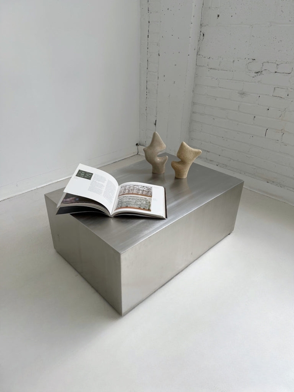 Coffee Table: Brushed Steel Block with Sharp Geometric Edges