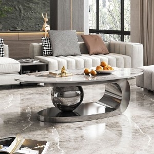 Coffee Table: Oval Stone Top Polished Silver Sphere Base