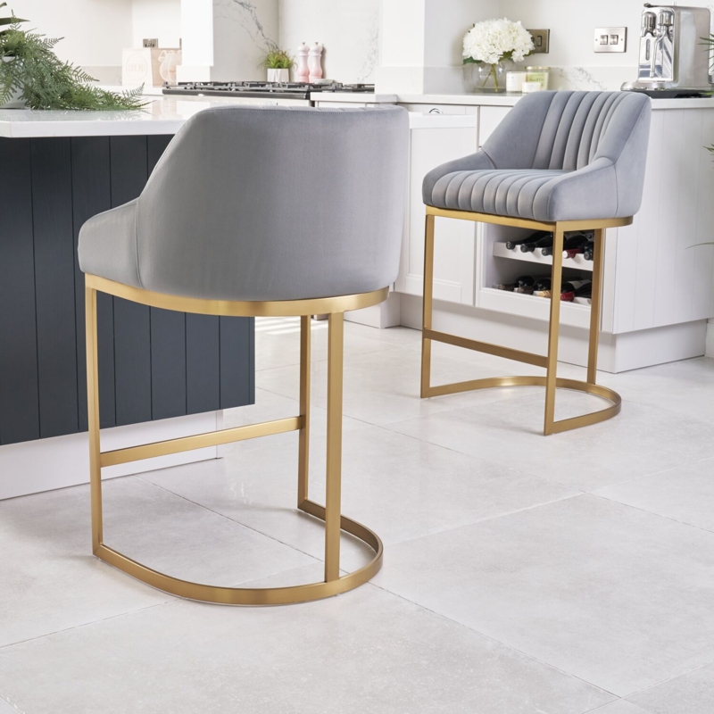 Cool Grey Bar Stool with Vertical Ribbing and Gold C-Shaped Base