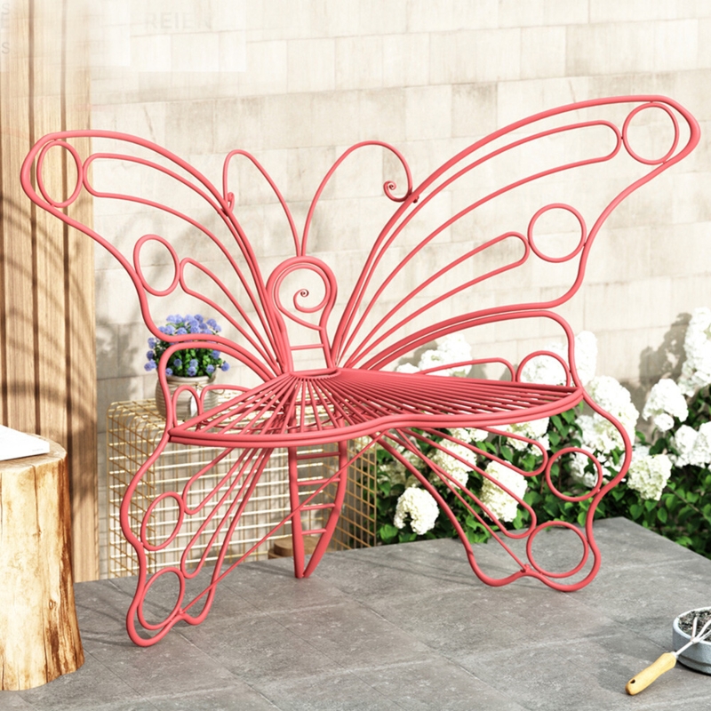 Coral Pink Garden Bench made of Metal with Open Wire Butterfly Design