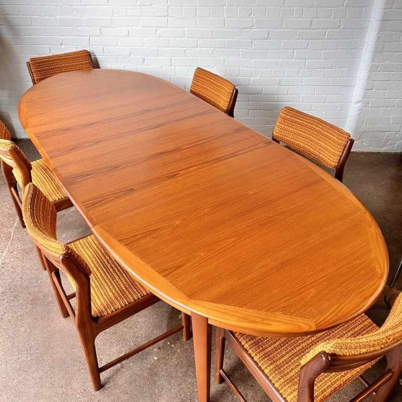 Danish Modern Dining Set with Orange Textured Upholstery and Tapered Legs