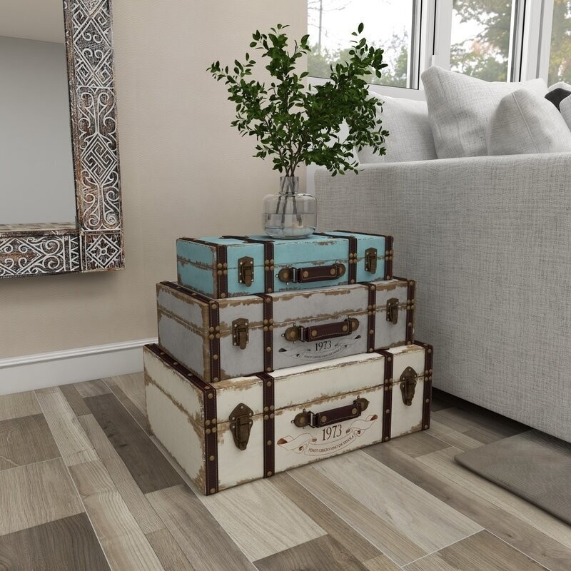 Decorative Stacked Trunks: Distressed Trio with 1973 Typography & Studs