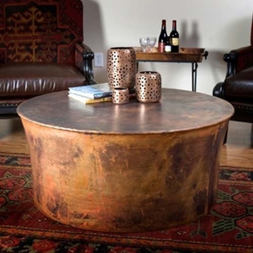 Distressed Copper Coffee Table with Weathered Metallic Cylinder Base