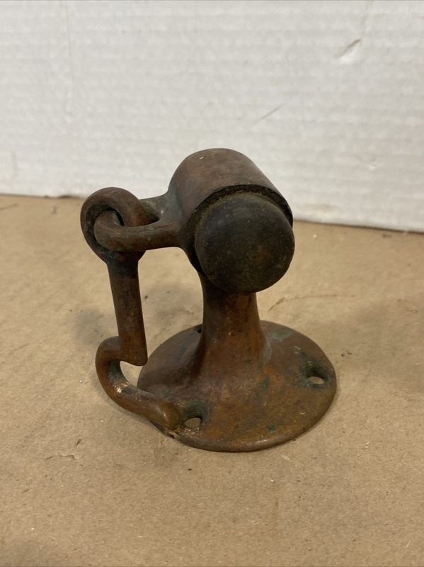Door Stop: Industrial Floor Mount Cast Metal with Integrated Hook