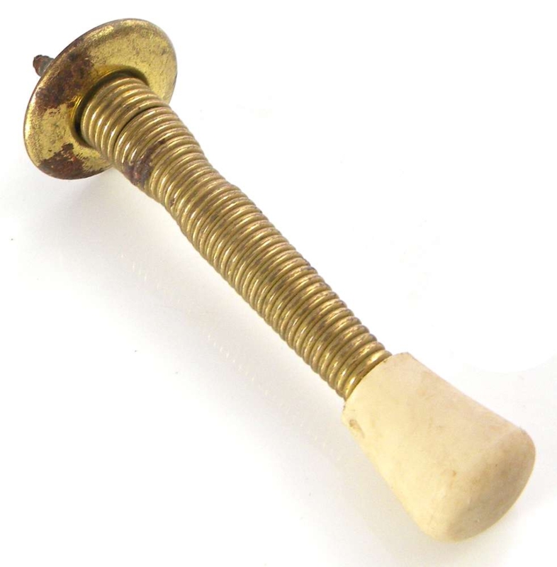 Door Stop: Traditional Flexible Spring Design in Aged Brass Finish